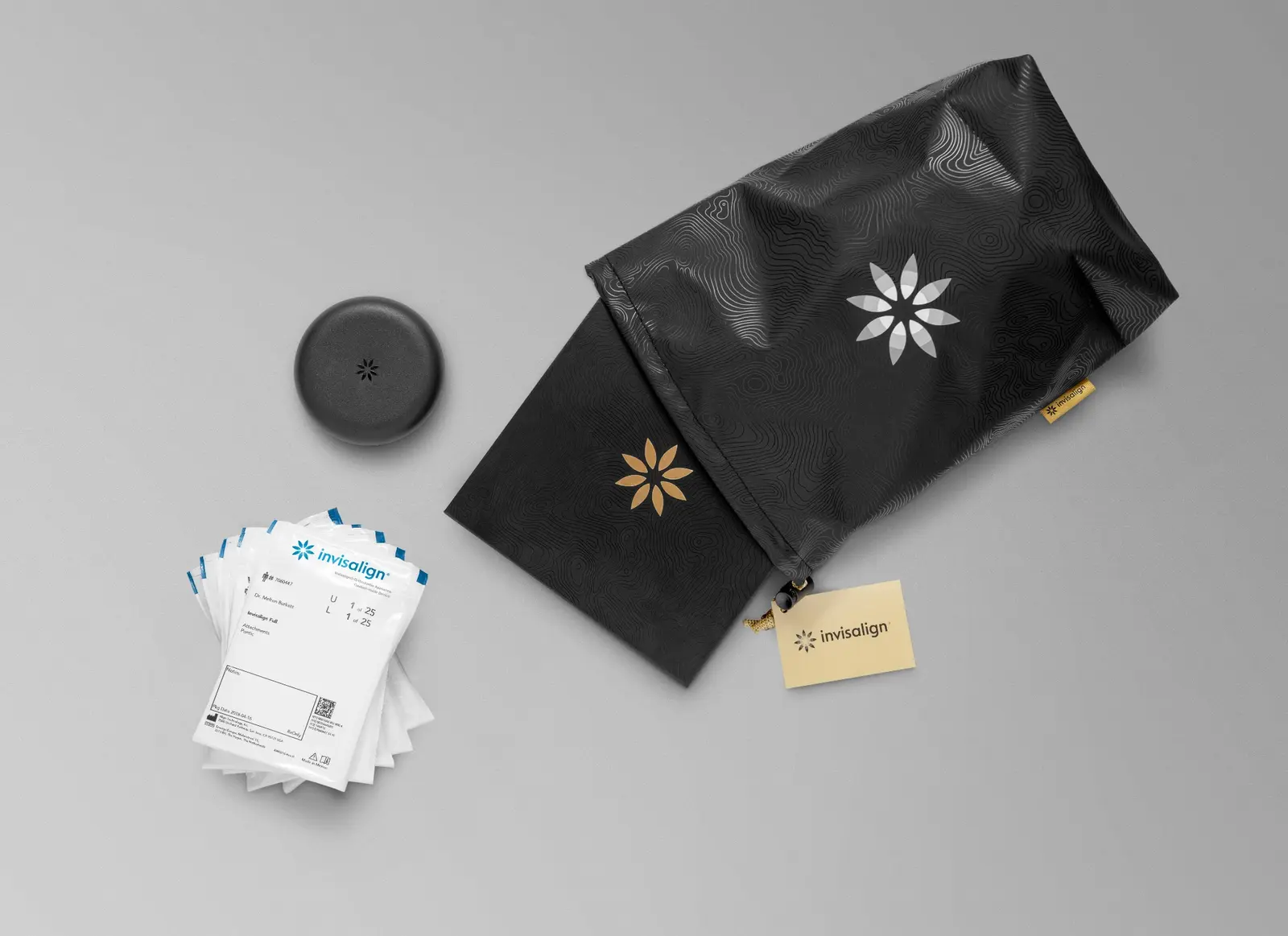 Invisalign starter kit, aligner packets, pouch and case