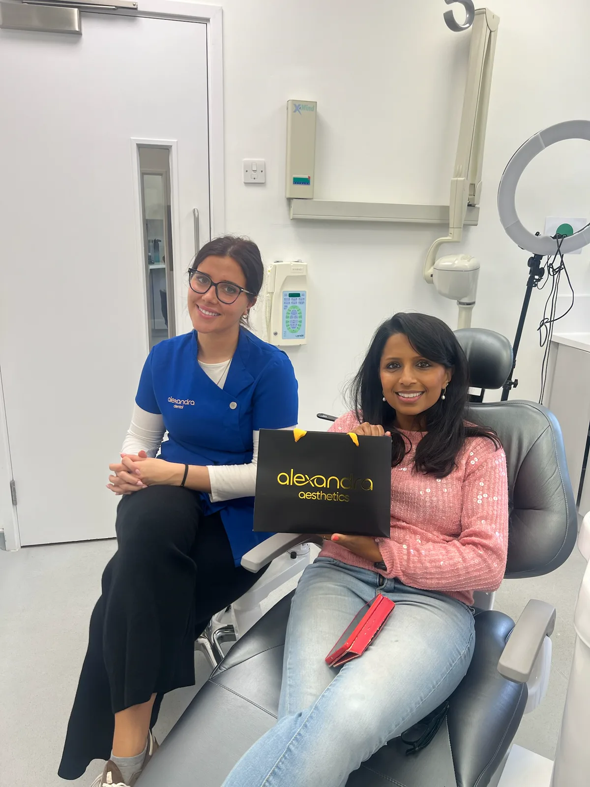 Patient with Alexandra Dental clinician after a dental appointment